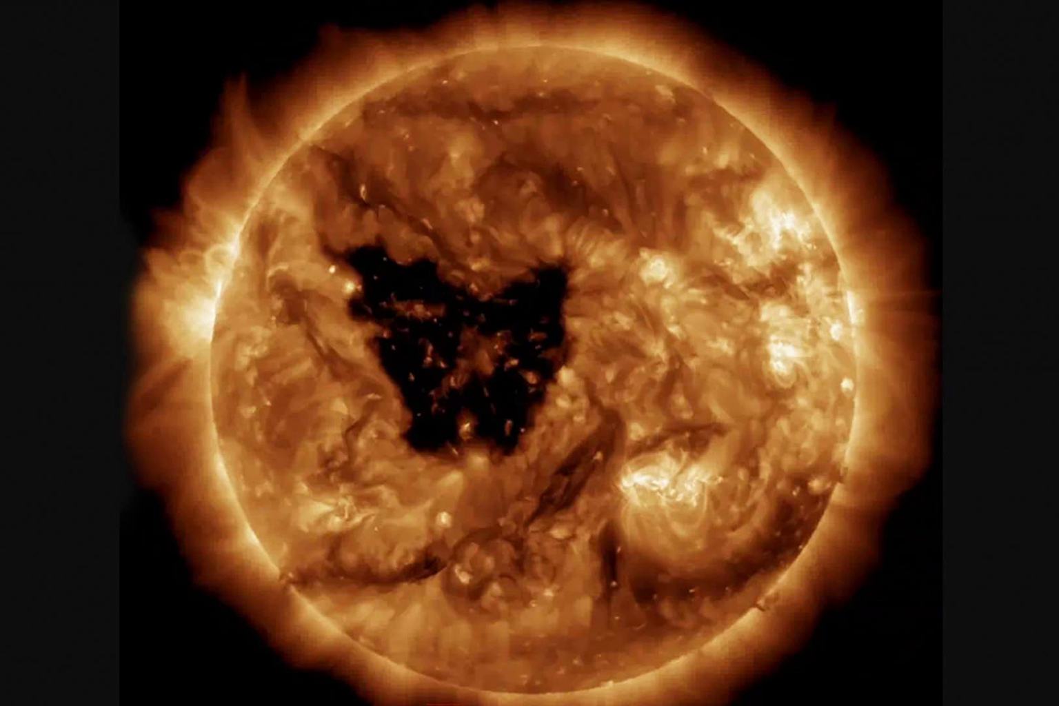 Giant Butterfly-Shaped Hole Appears On Sun's Surface