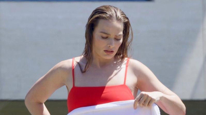 Paparazzi Capture Margot Robbie During Chanel Malibu Photoshoot